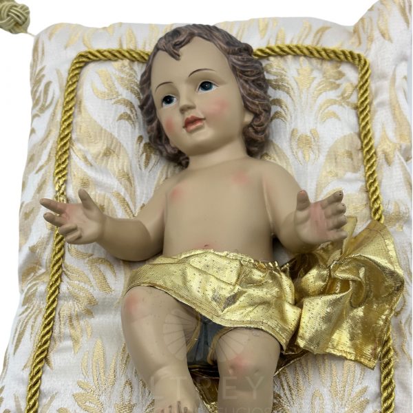 niño jesus con cojin blanco